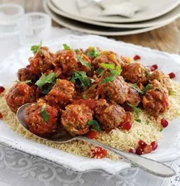 Lamb Meatball Tagine on plate of couscous. Copyright - all rights reserved - Simply Beef and Lamb. Permission to use kindly granted by AHDB Simply Beef and Lamb Recipes - From Simply Recipes website URL https://www.simplybeefandlamb.co.uk/recipes/lamb-meatball-tagine/ Lamb Meatball Tagine on plate of couscous. Copyright - all rights reserved - Simply Beef and Lamb. Permission to use kindly granted by AHDB Simply Beef and Lamb Recipes - From Simply Recipes website URL https://www.simplybeefandlamb.co.uk/recipes/lamb-meatball-tagine/