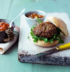 BBQ Lamb & Apricot and Coriander Burger in bread roll on wood plate with salsa sauces in pots. Copyright - all rights reserved - Simply Beef and Lamb. Permission to use kindly granted by AHDB Simply Beef and Lamb Recipes - From Simply Recipes website URL https://www.simplybeefandlamb.co.uk/recipes/bbq-lamb-apricot-and-coriander-burger/ BBQ Lamb & Apricot and Coriander Burger in bread roll on wood plate with salsa sauces in pots. Copyright - all rights reserved - Simply Beef and Lamb. Permission to use kindly granted by AHDB Simply Beef and Lamb Recipes - From Simply Recipes website URL https://www.simplybeefandlamb.co.uk/recipes/bbq-lamb-apricot-and-coriander-burger/